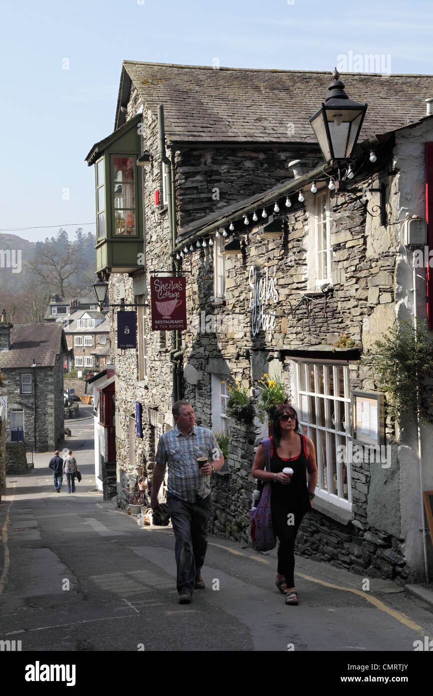 Couple Walking Past Sheila S Cottage Restaurant Along The Slack In