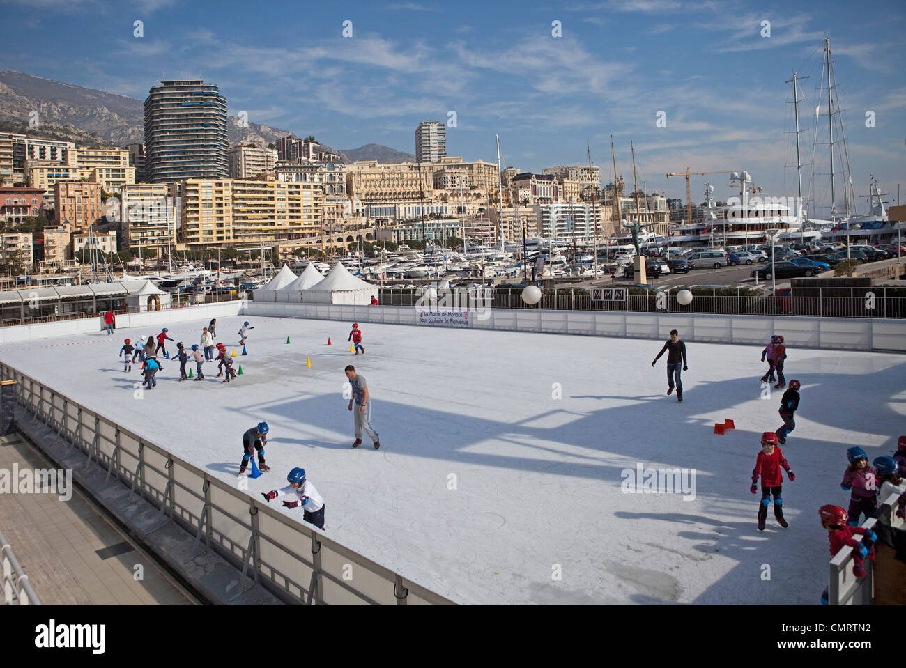 Open air ice rink in Monaco, Cote d'Azur France . Children skating. 124703 Monaco Stock Photo