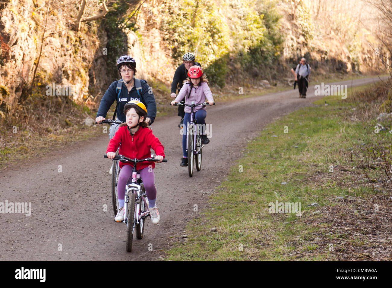 The monsal trail in Derbyshire.A family cycling Stock Photo Alamy