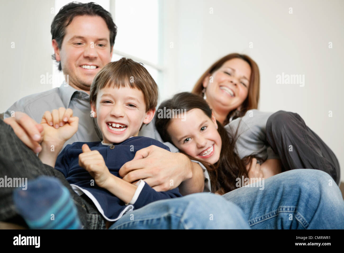 Family romping Stock Photo