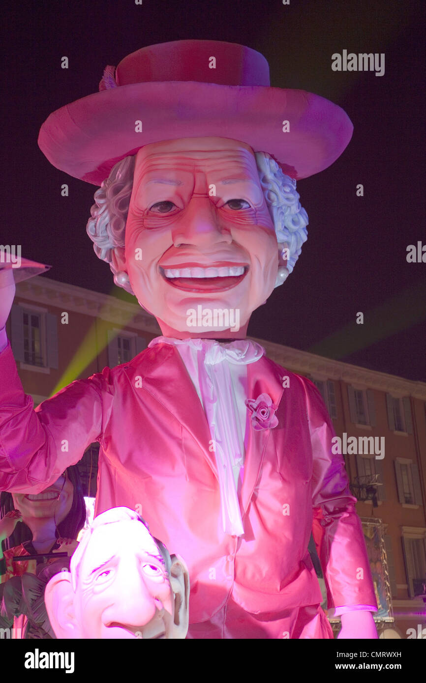 Carnaval de Nice 2012. cartoon effigy of HM Queen Elizabeth 2nd during  night Carnival parade. 124962 Nice Carnival Stock Photo - Alamy