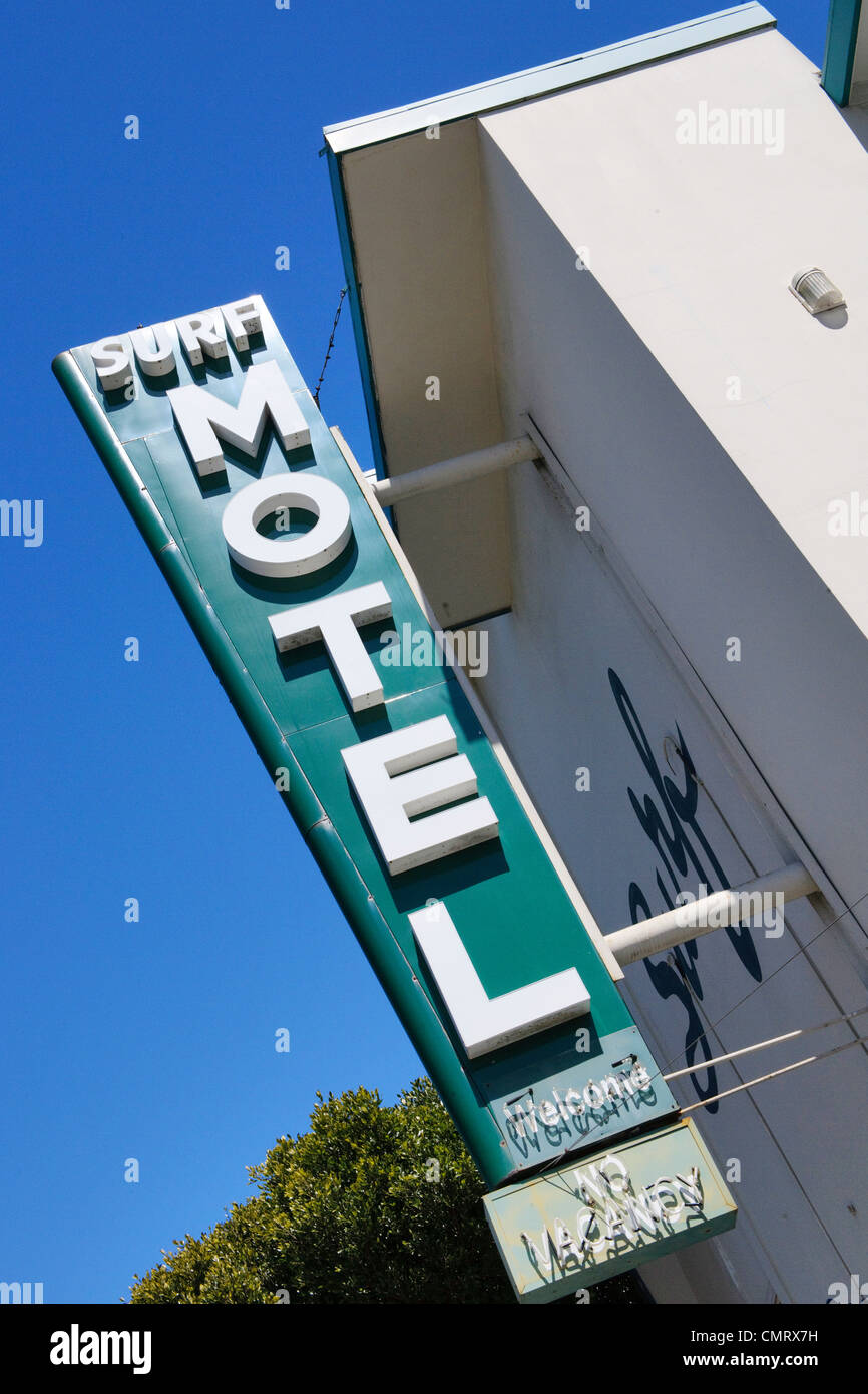 USA motel sign against blue sky and hotel Stock Photo
