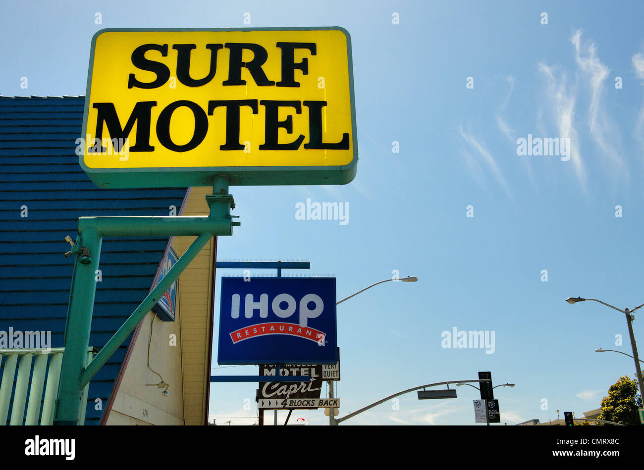 American California motel signs against blue sky Stock Photo