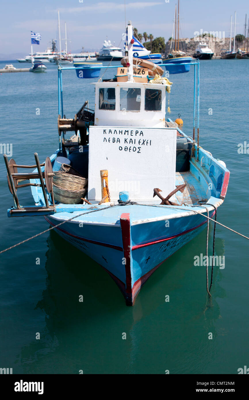 Small fishing boat in the main harbor of tingaki, Kos, Greece Stock Photo