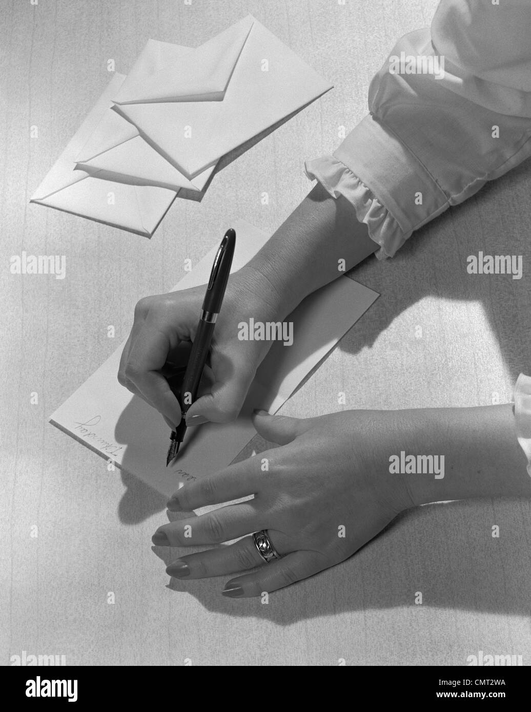 Woman hands holding letter Black and White Stock Photos & Images Alamy