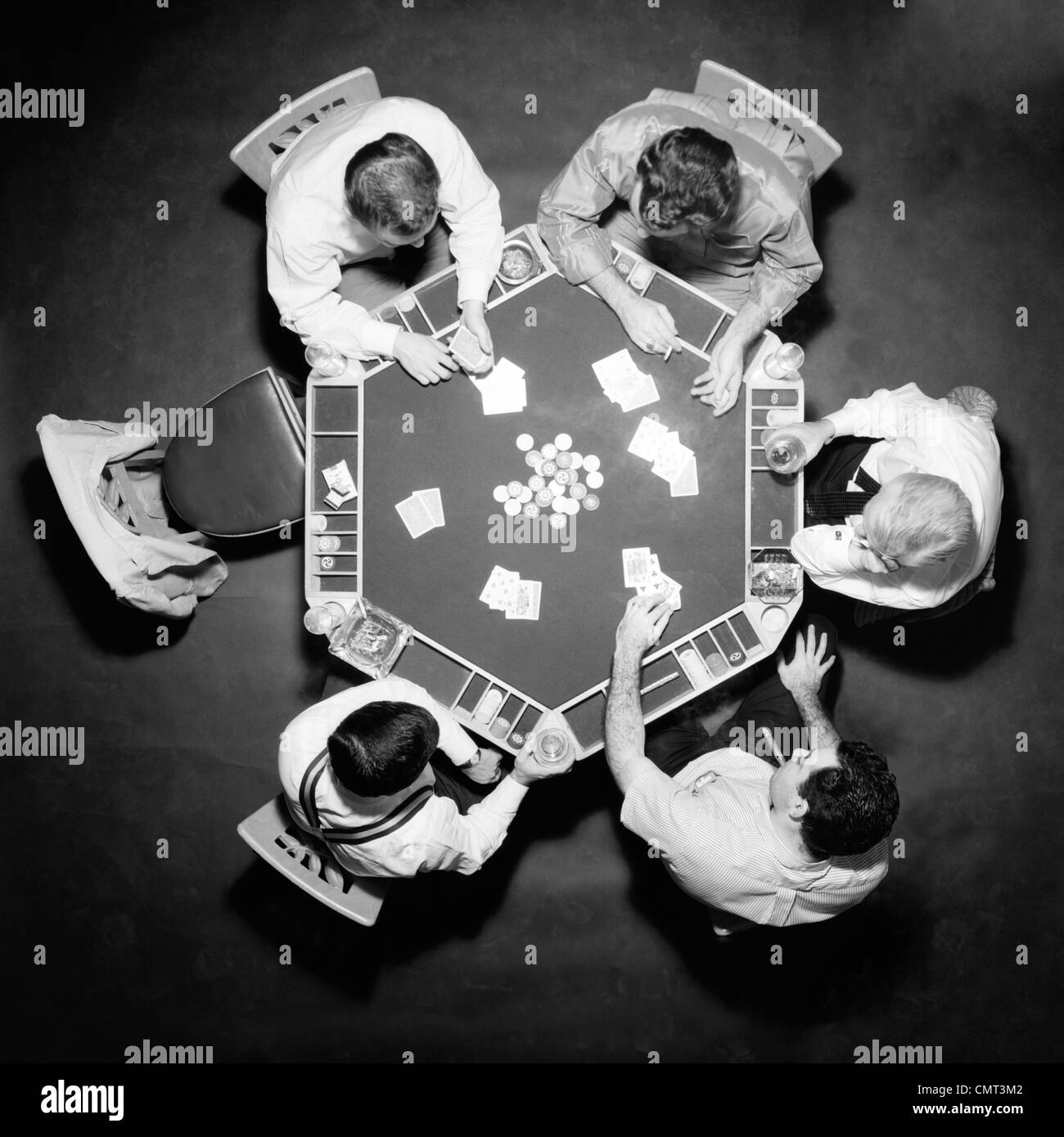 1950s AERIAL OF 5 MEN PLAYING POKER Stock Photo