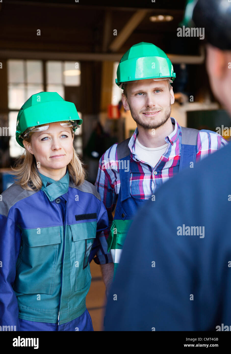 Colleagues in industrial environment Stock Photo