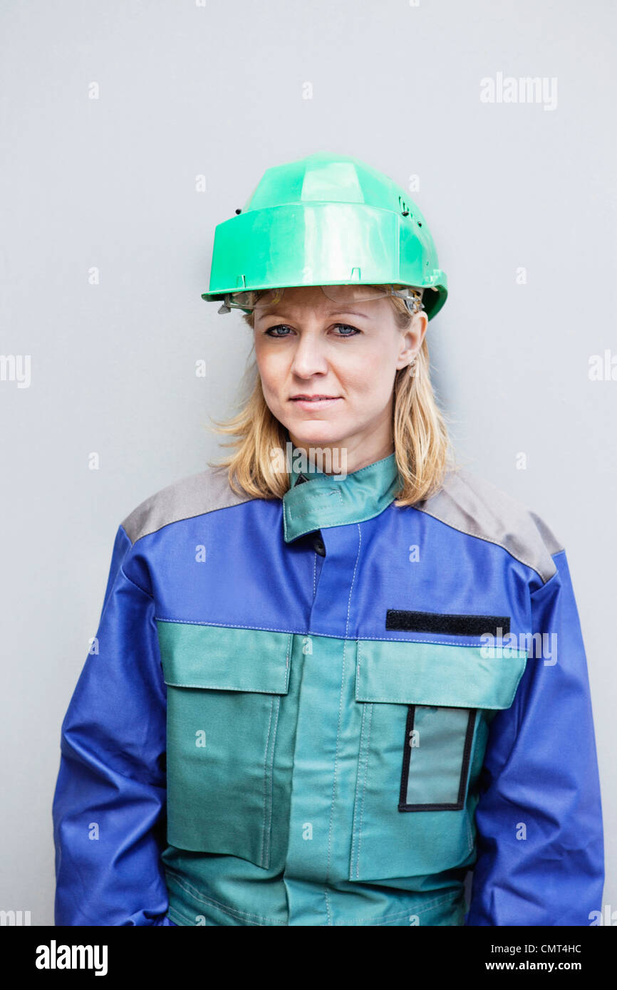 Woman wearing helmet hi-res stock photography and images - Alamy