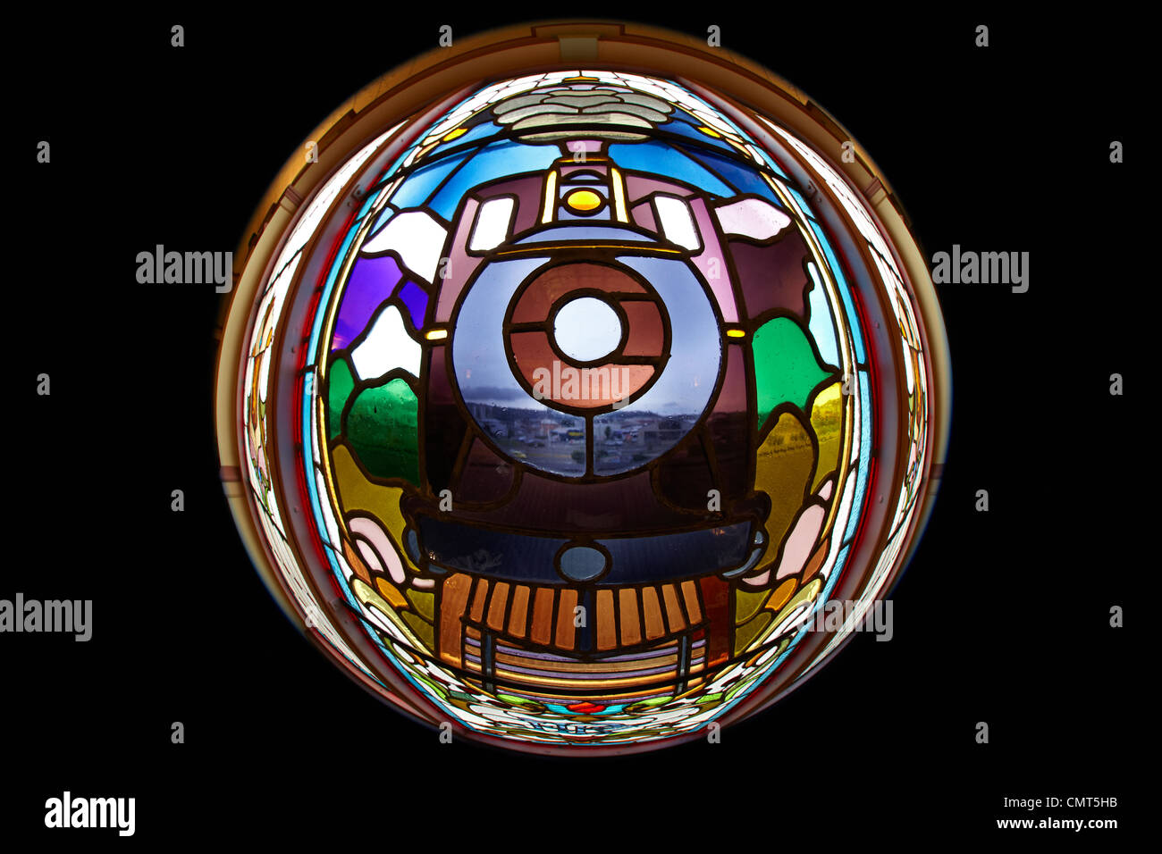 Train on stained glass window, inside historic Railway Station, Dunedin, South Island, New Zealand - fisheye Stock Photo