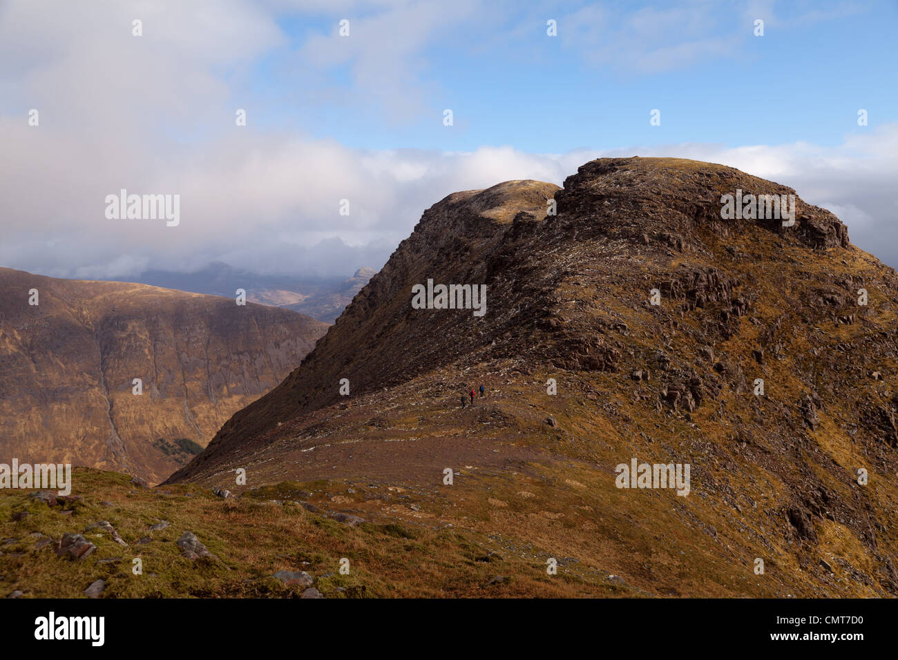 The bealach na Ba isthe third highest road in Scotland and Sgurr a' Chaorachain is a corbett that can easily be climbed from it. Stock Photo