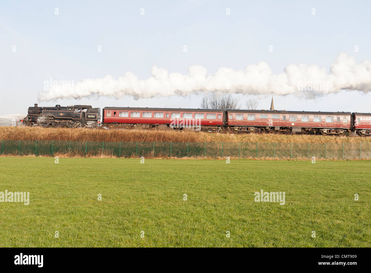 Steam locomotive pulling a passenger train on the East Lancs Railway at Heywood Stock Photo