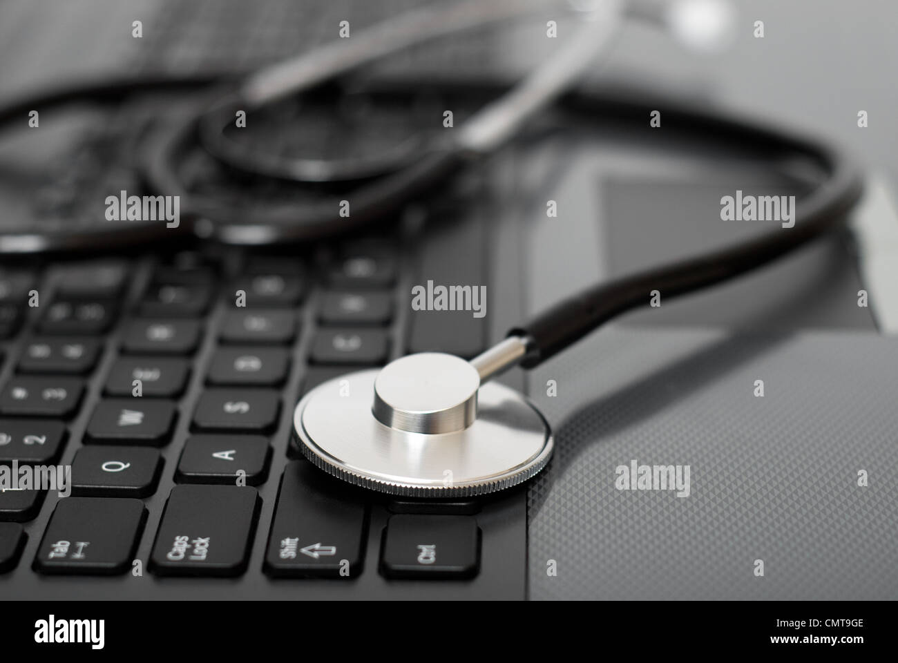 Stethoscope on a computer keyboard Stock Photo - Alamy
