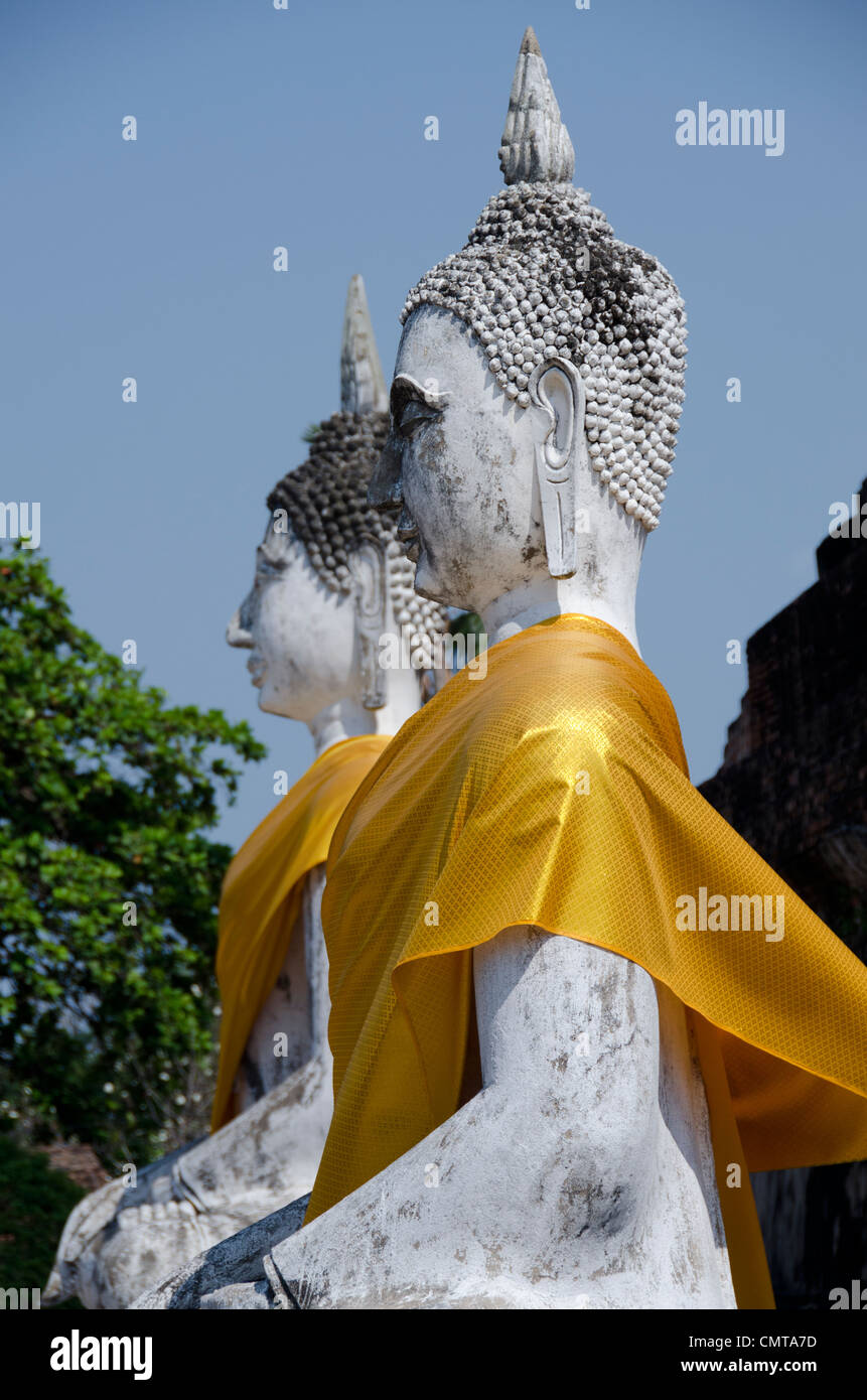 Thailand, Ayutthaya. Wat Phra Chao Phya-thai (aka Wat Yai Chai-mongkol). Historic monastery built in 1357. Buddha statue. Stock Photo
