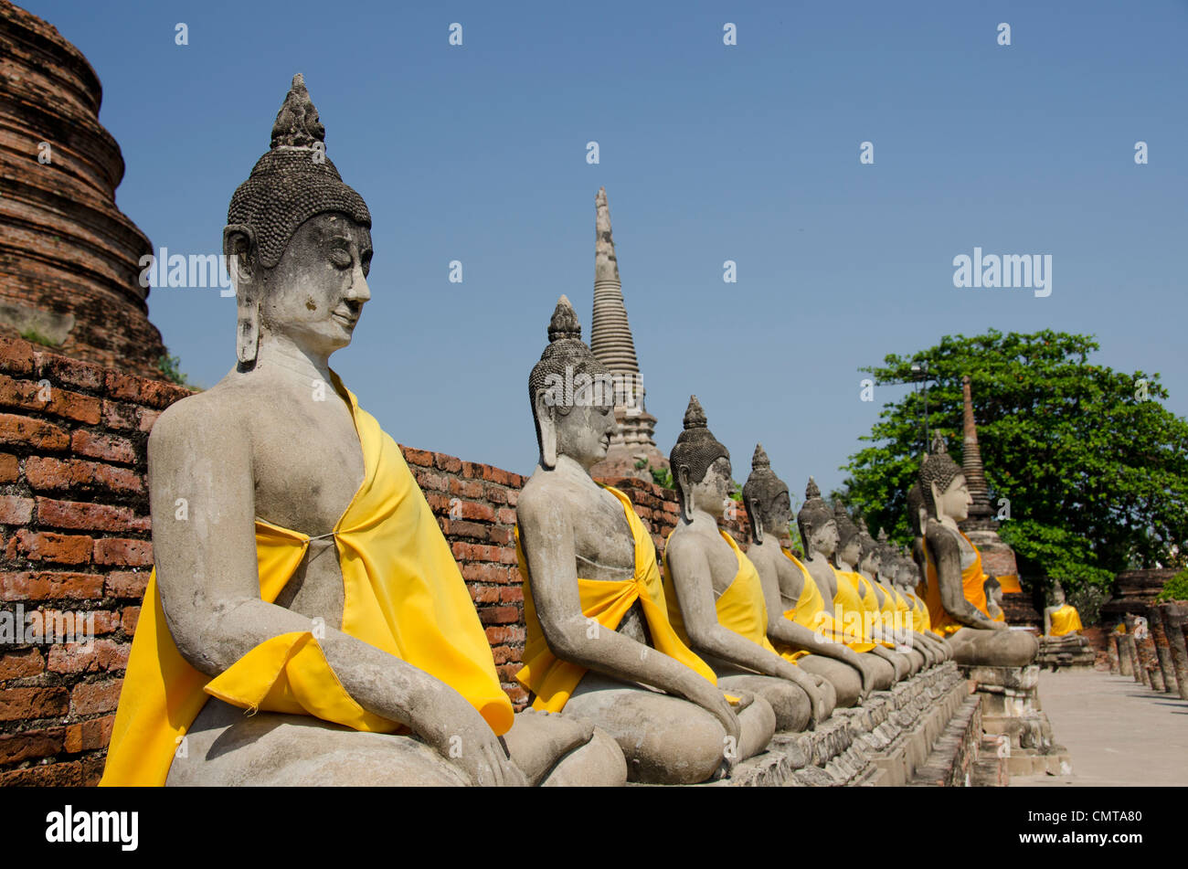 Thailand, Ayutthaya. Wat Phra Chao Phya-thai (aka Wat Yai Chai-mongkol). Historic monastery built in 1357. Buddha statue. Stock Photo