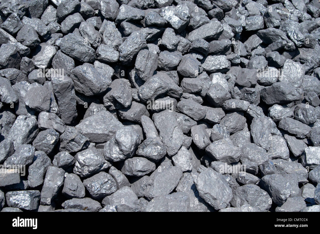 Coal in a large stack ready for use in a steam Stock Photo