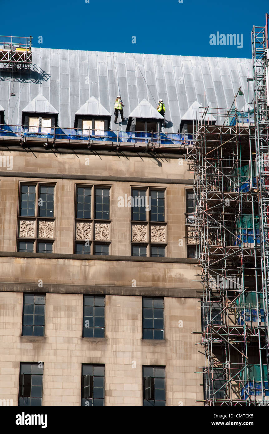 Workers on the Manchester Town Hall extension building. Stock Photo