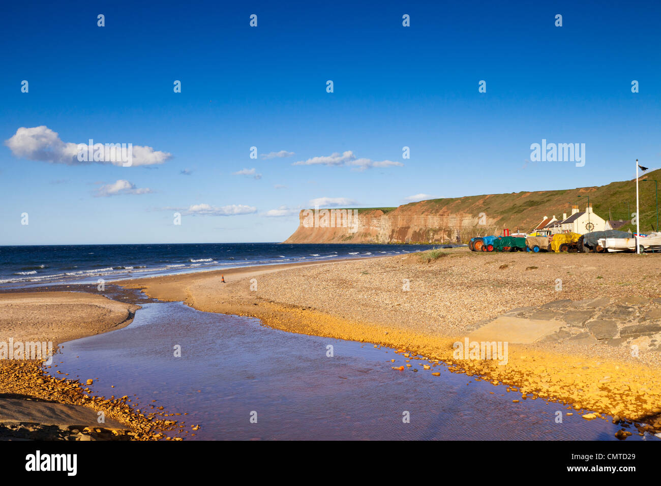Late afternoon sun over the beach and the Huntcliff at Saltburn-by-the-Sea, Redcar and Cleveland, North Yorkshire, England, Stock Photo