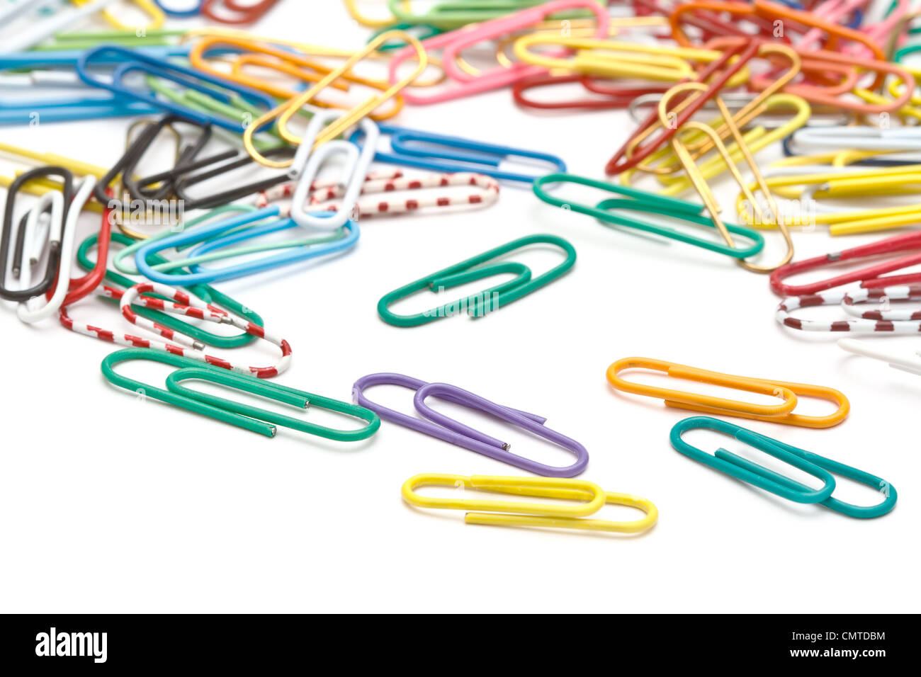 Colorful office paper clips closeup on white Stock Photo
