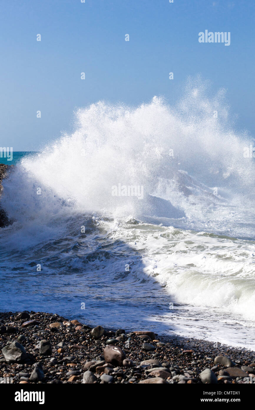 Heavy Atlantic rollers crashing onto rocks on the beach at Ajuy on the west coast of Fuerteventura, Canary Islands Stock Photo