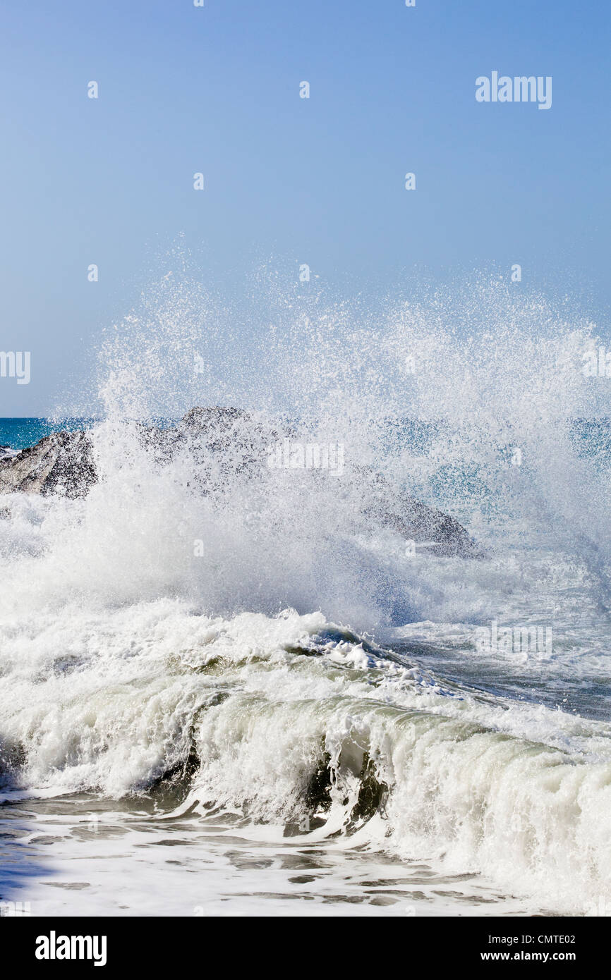 Heavy Atlantic rollers crashing onto rocks on the beach at Ajuy on the west coast of Fuerteventura, Canary Islands Stock Photo