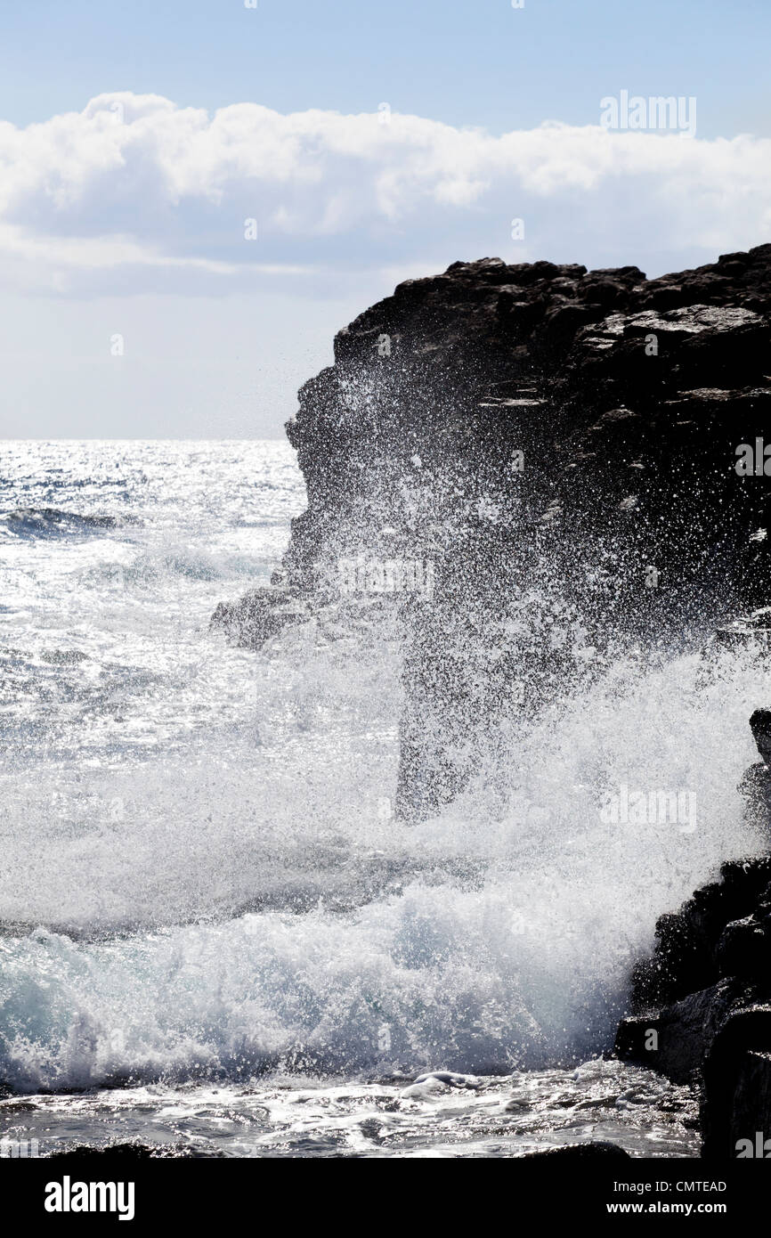 Waves breaking against rocks at Las Salinas, Fuerteventura, Canary Islands Stock Photo