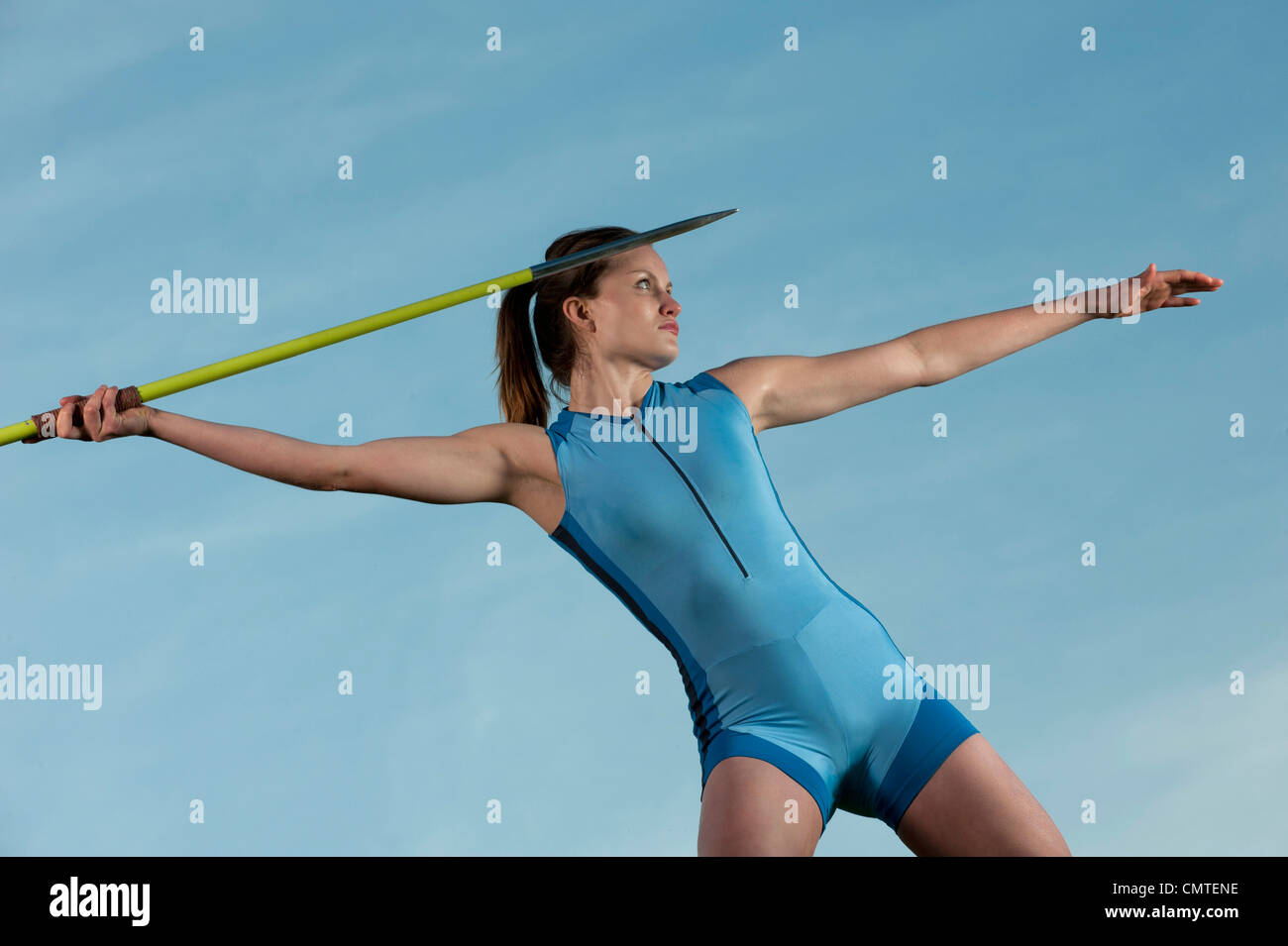 Caucasian athlete throwing javelin Stock Photo Alamy