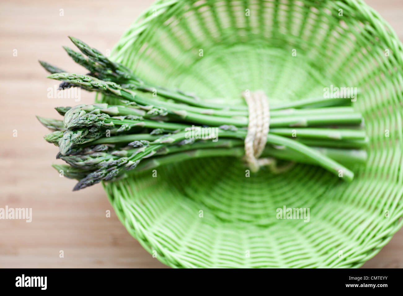 A basket with asparagus Stock Photo