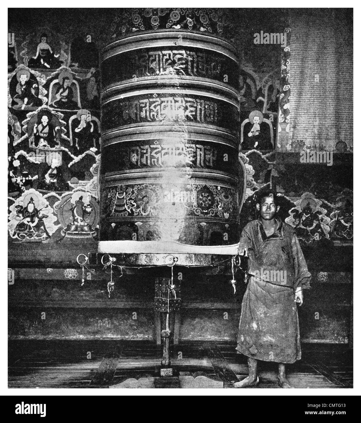 1925 Gigantic prayer wheel gilded yak hide Muli monastery Tibet Stock Photo
