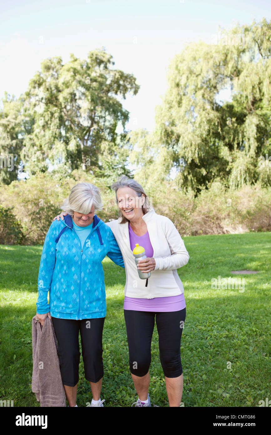 Two women standing together hi-res stock photography and images - Alamy