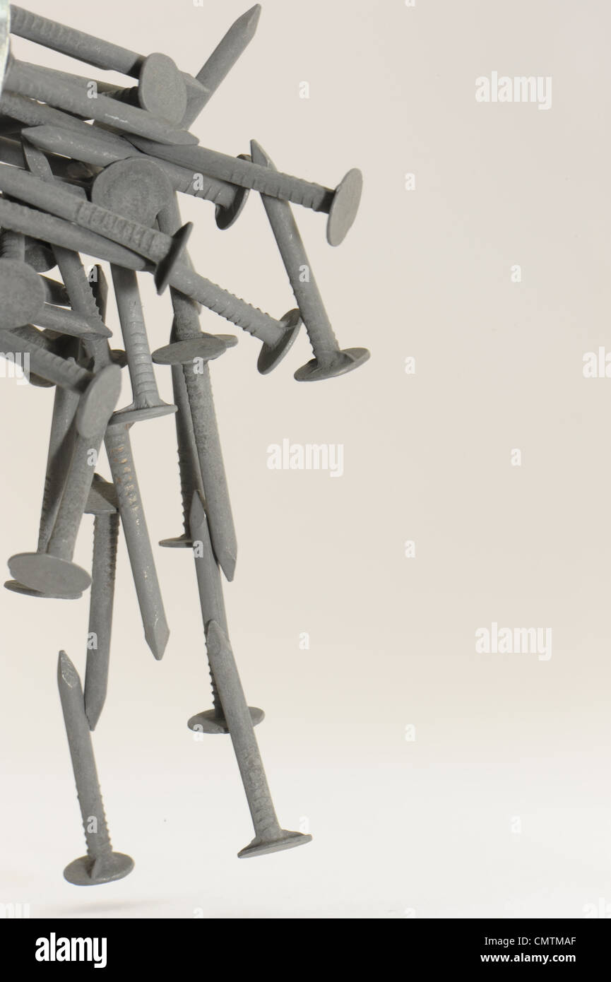 nails roofing tacks taken on a white background Stock Photo Alamy