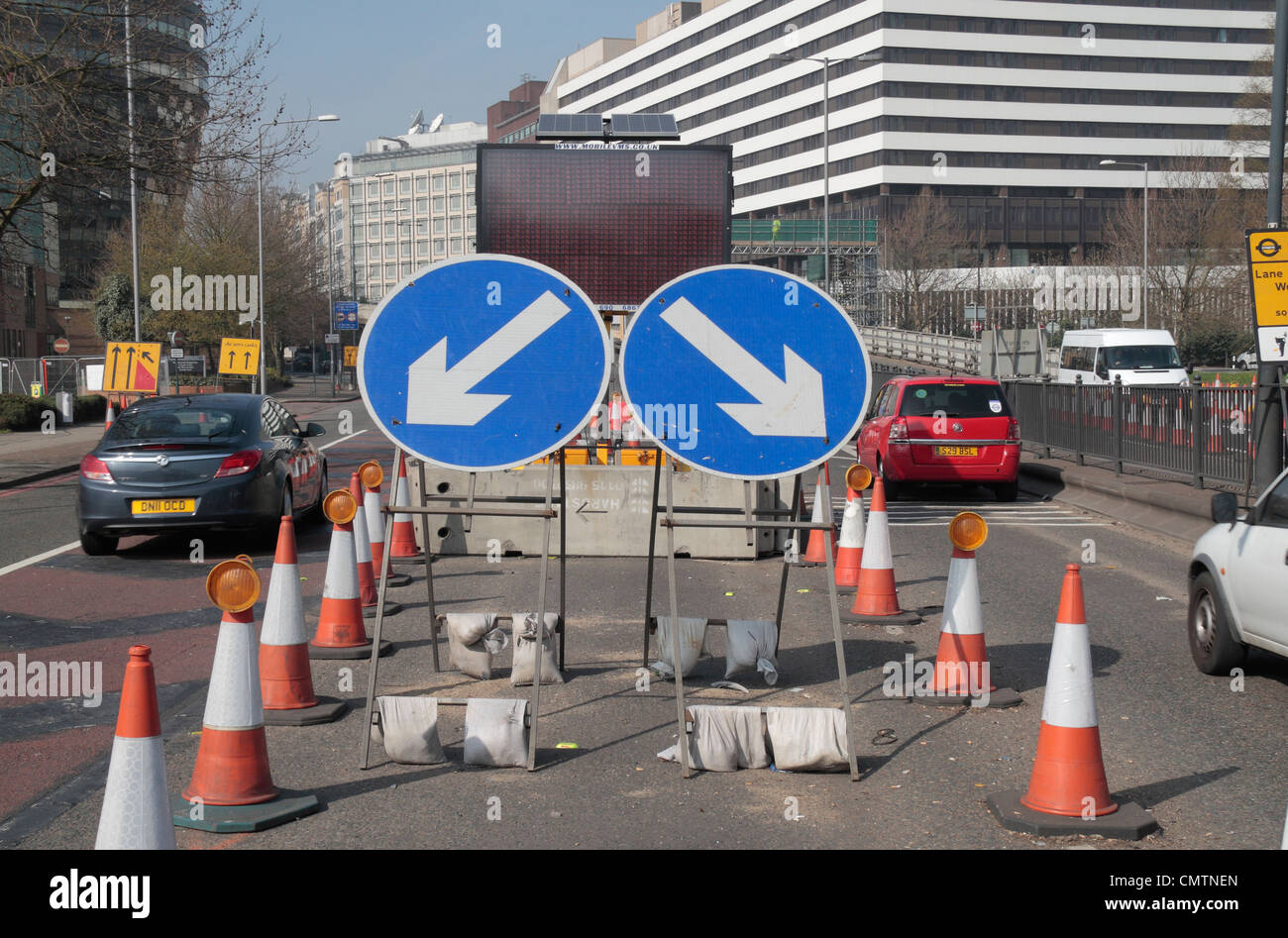 Roadworks signs directing traffic at the start of the Hammersmith flyover (A4) repairs in 2012 in Hammersmith, London, UK. Stock Photo