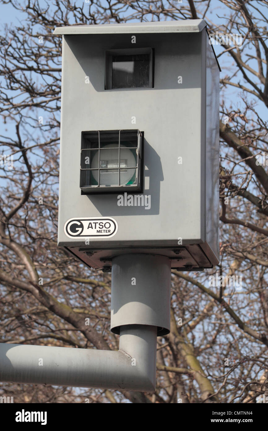 A Gatso traffic light camera (facing traffic light) in Hammersmith, West London, UK.. Stock Photo