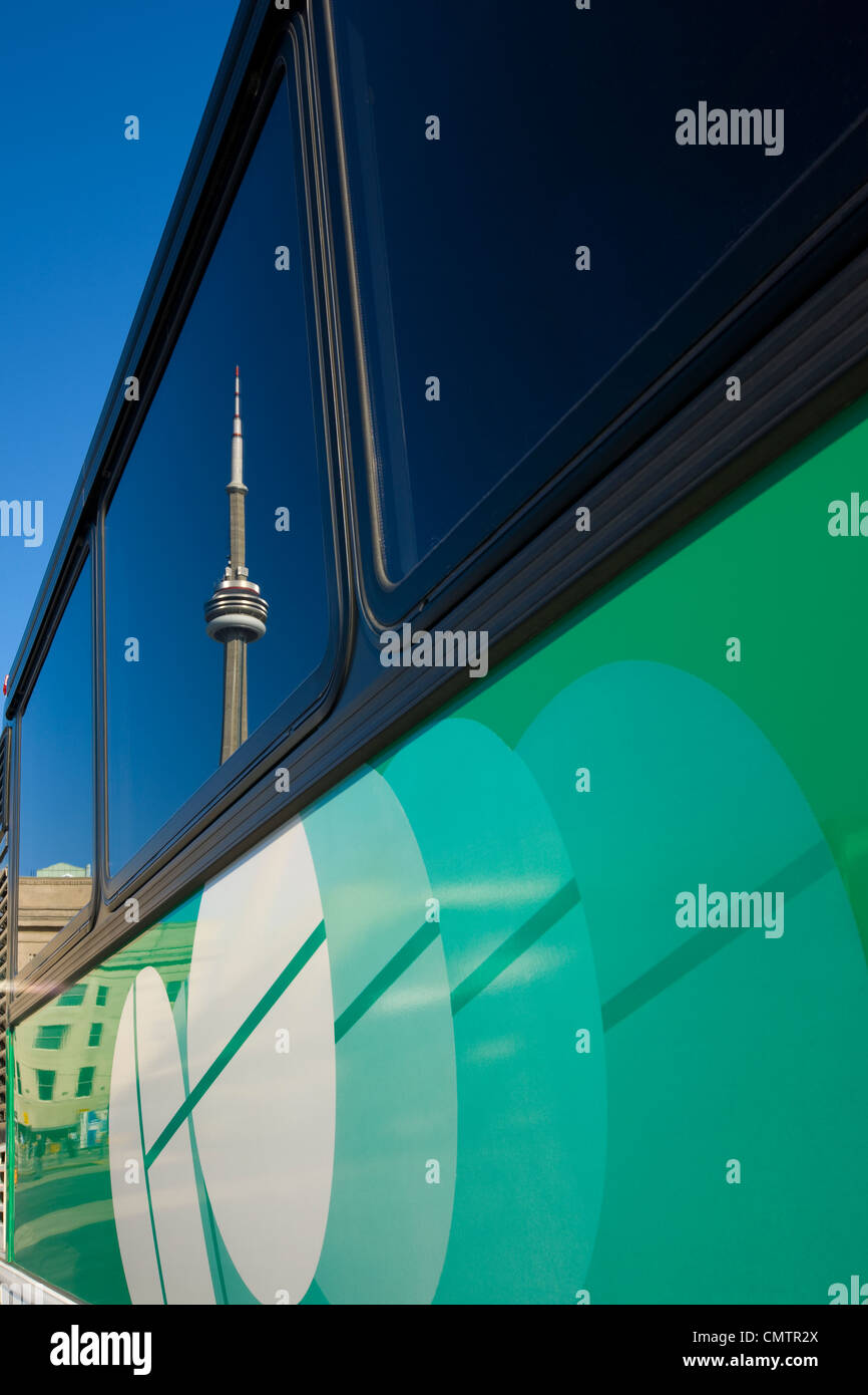 CN Tower reflected in a Go Bus, Toronto, Ontario Stock Photo