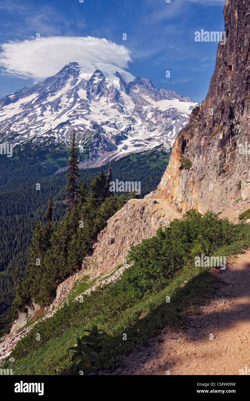 Spectacular view of Washington’s Mount Rainier  with lenticular cloud above Paradise Valley from the trail up to Plummer Peak. Stock Photo