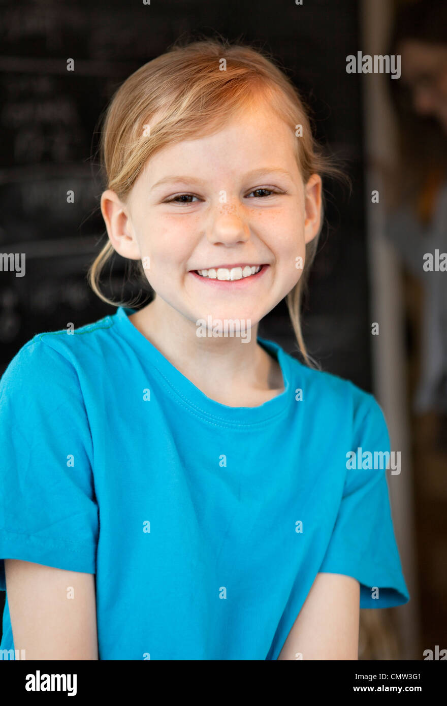 Girl in blue t-shirt Stock Photo