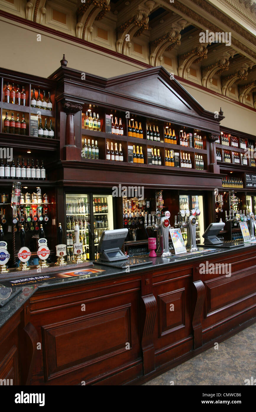 Edinburgh, UK - July 24, 2010: Inside view of a public house, known as pub, for drinking and socializing. Stock Photo
