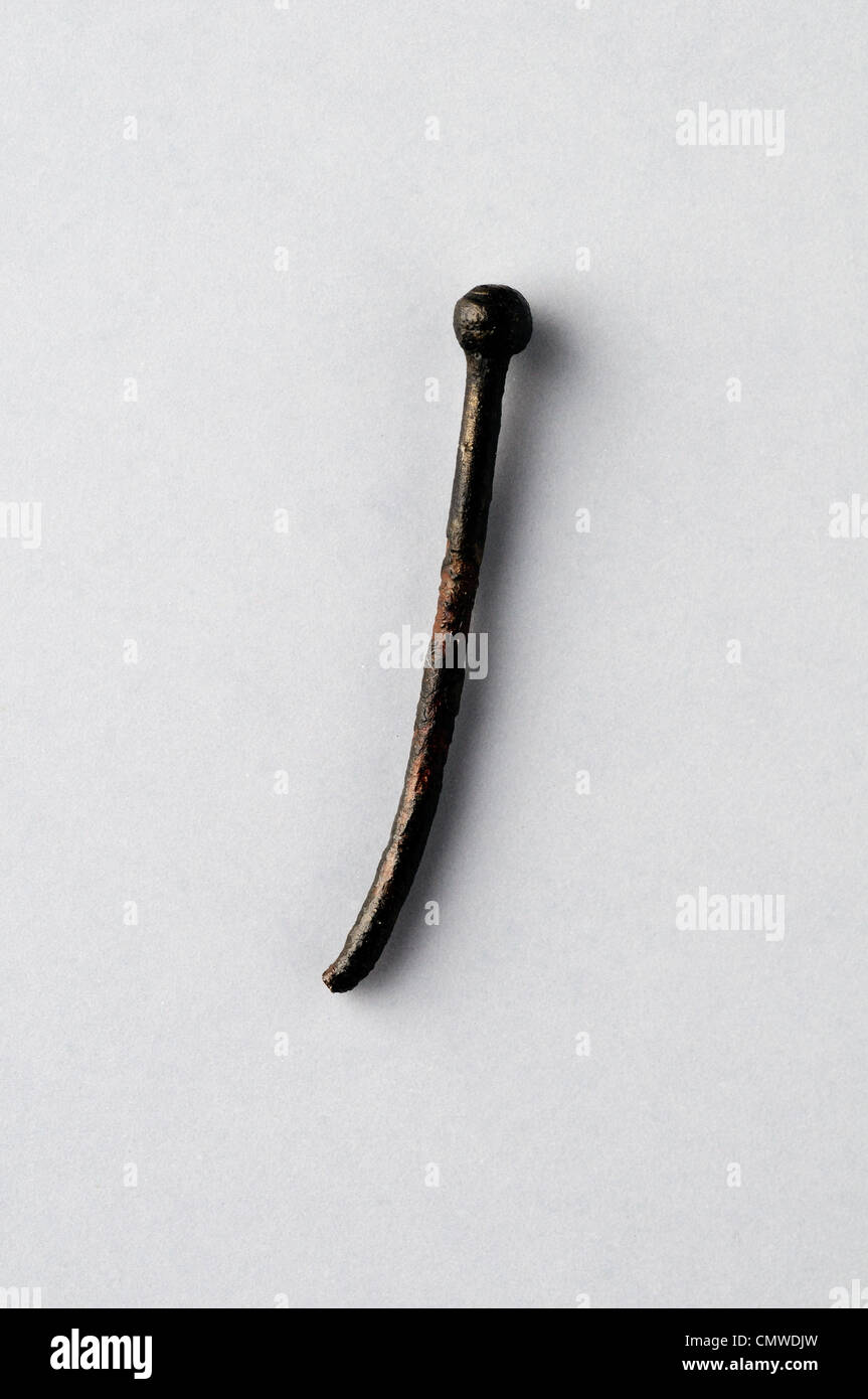Bronze Needle -  Roman period, from ' House of Griffins '- Archaeological site of Complutum in Alcalá de Henares. SPAIN Stock Photo
