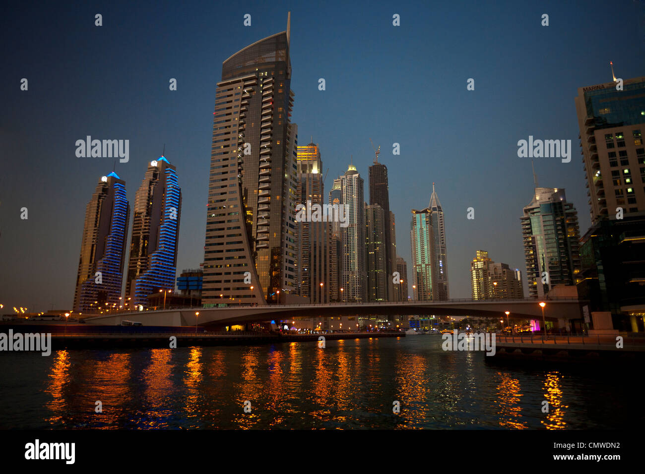 The skyscrapers of the 'Dubai Marina' area by night (Dubai - the United Arab Emirates). Stock Photo