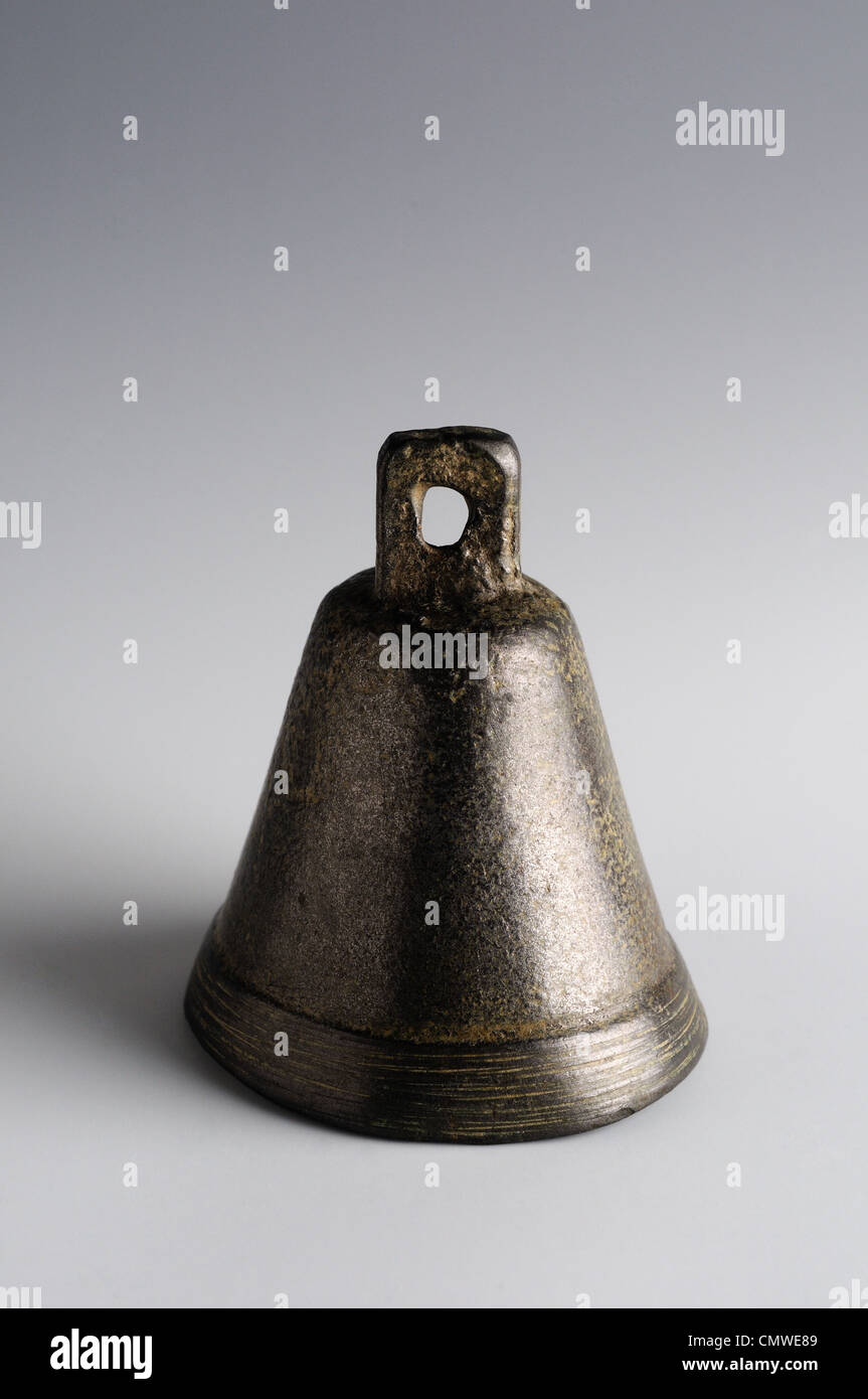 Bronze bell. Roman period, from the archaeological site of Complutum in Alcala de Henares (Madrid). SPAIN. Stock Photo