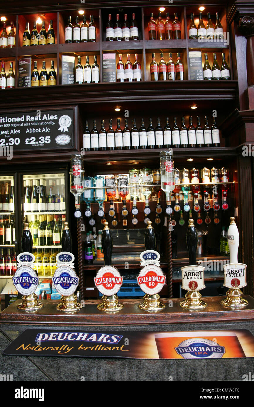 Edinburgh, UK - July 23, 2010: Inside view of a public house, known as pub, for drinking and socializing. Stock Photo