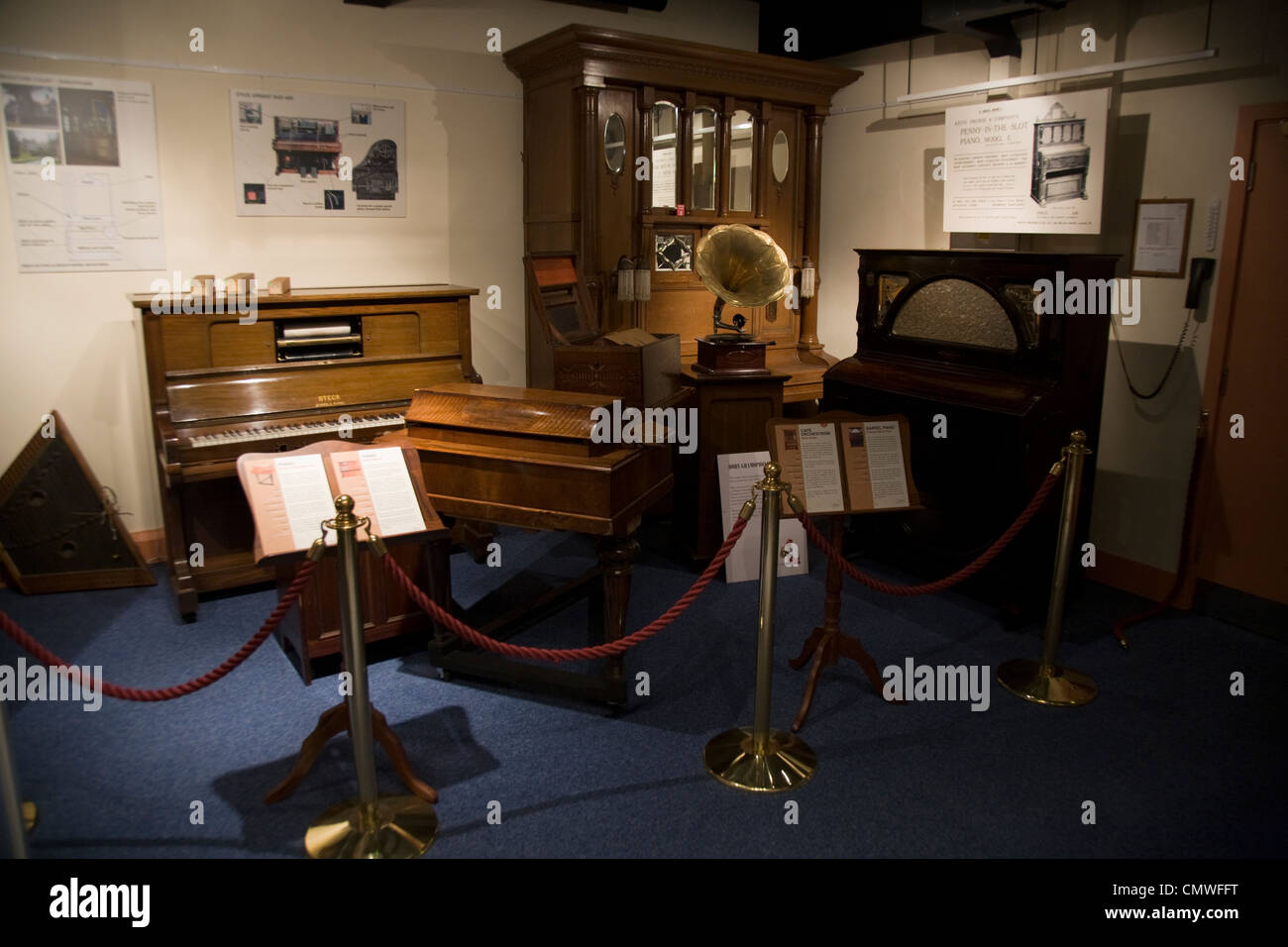 Exhibit display including a Steck Pianola piano & Barrel piano at the Musical Museum / music museums. Brentford UK Stock Photo