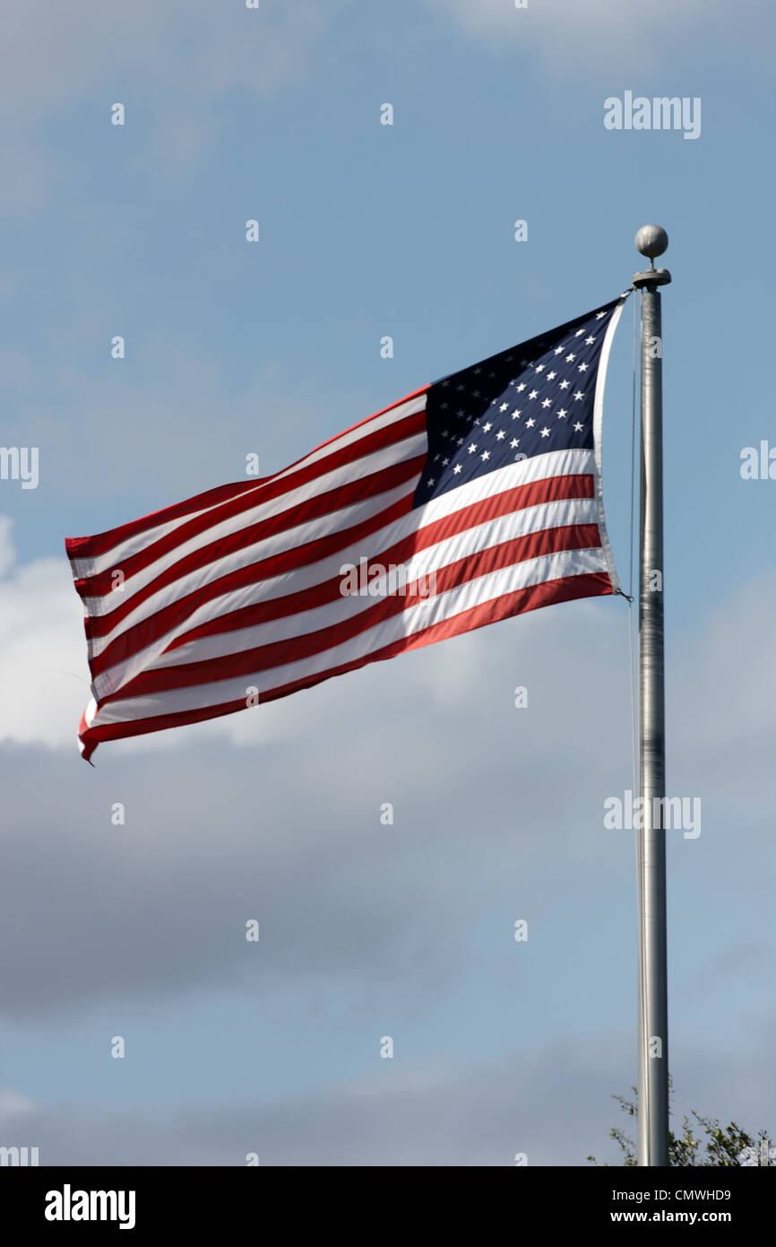 The American Flag with blue sky background Stock Photo - Alamy