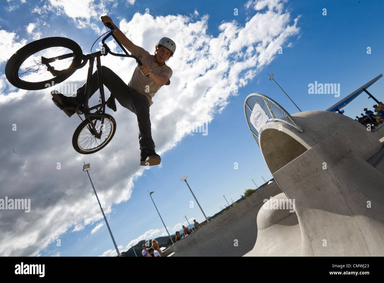 BMX rider performing trick at skate park. Cairns, Queensland, Australia