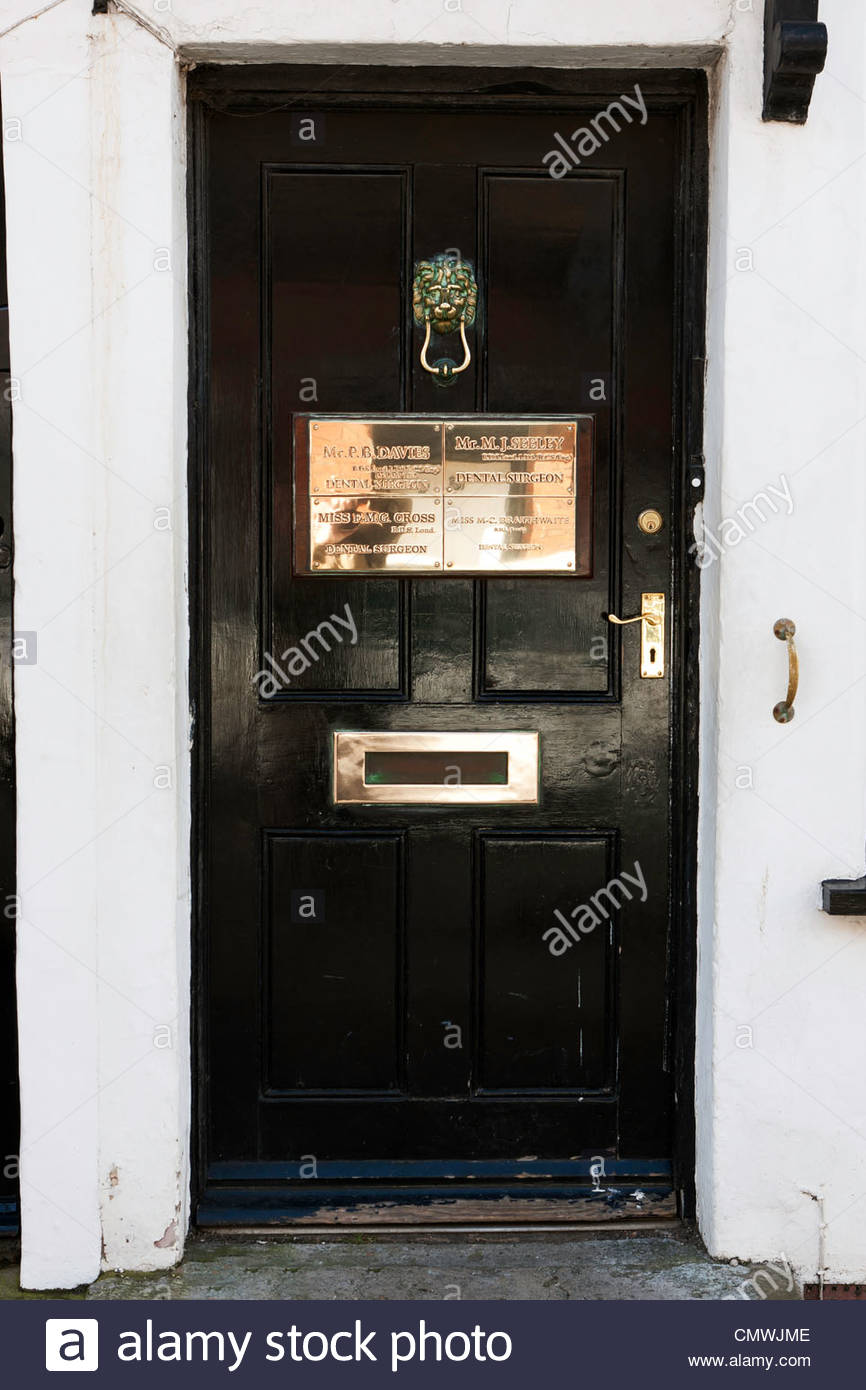 Dental Surgery Door With Shiny Brass Name Plates Rye East Sussex