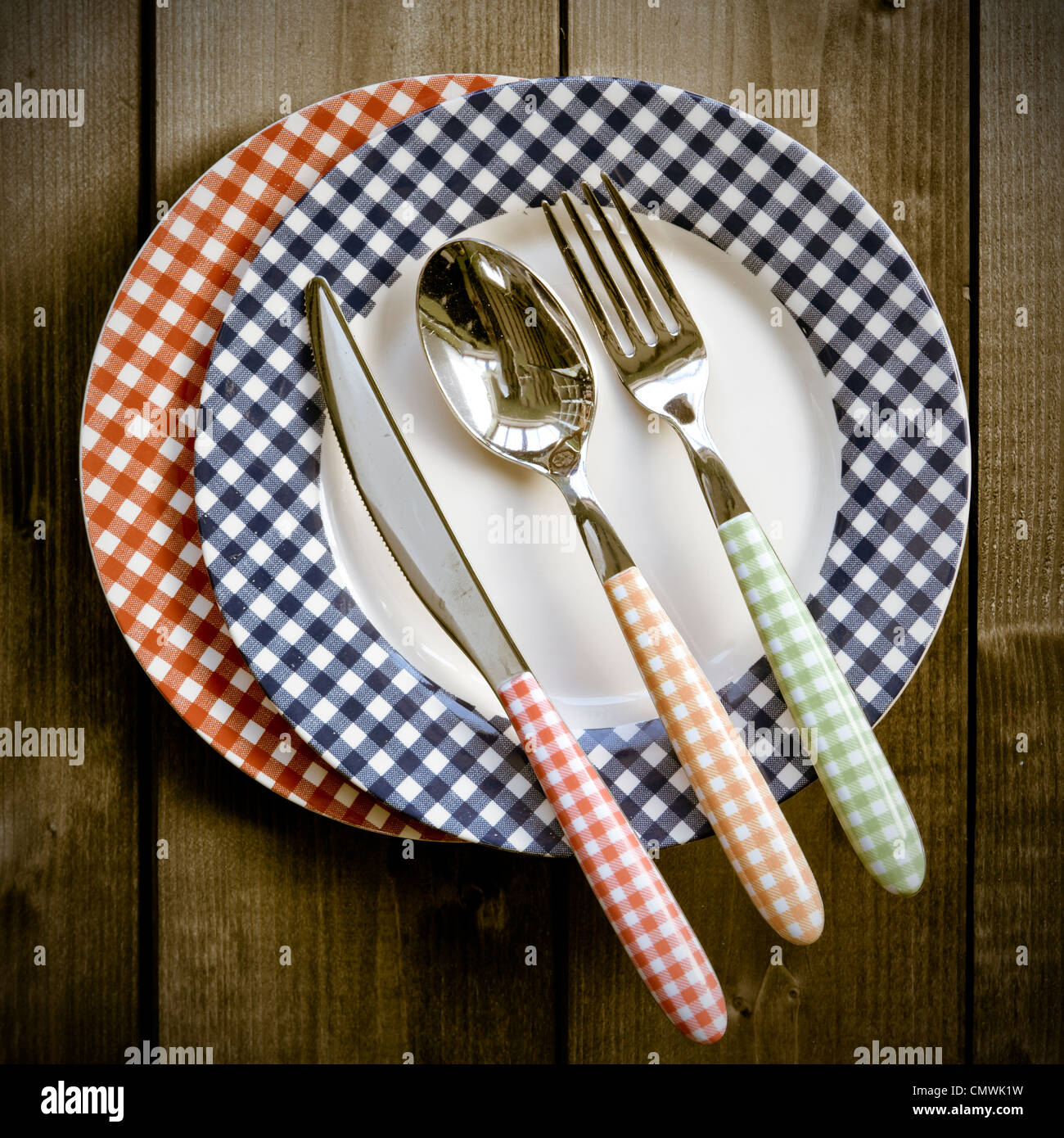 colorful, peasant dishes with colorful cutlery Stock Photo Alamy
