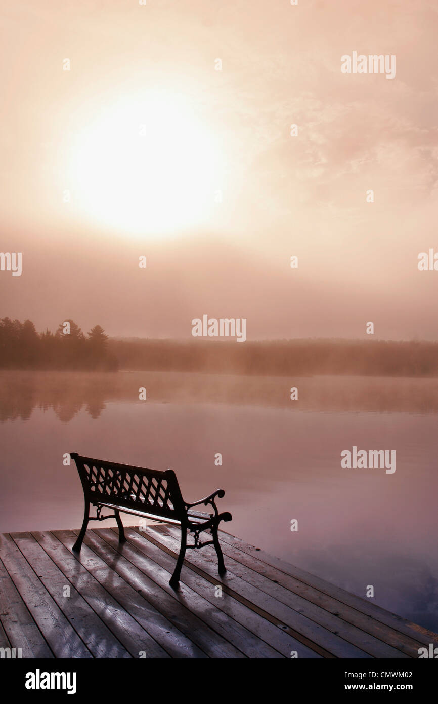 Dock in Morning Fog, Oxtongue Lake, Dwight, Ontario, CANADA Stock Photo