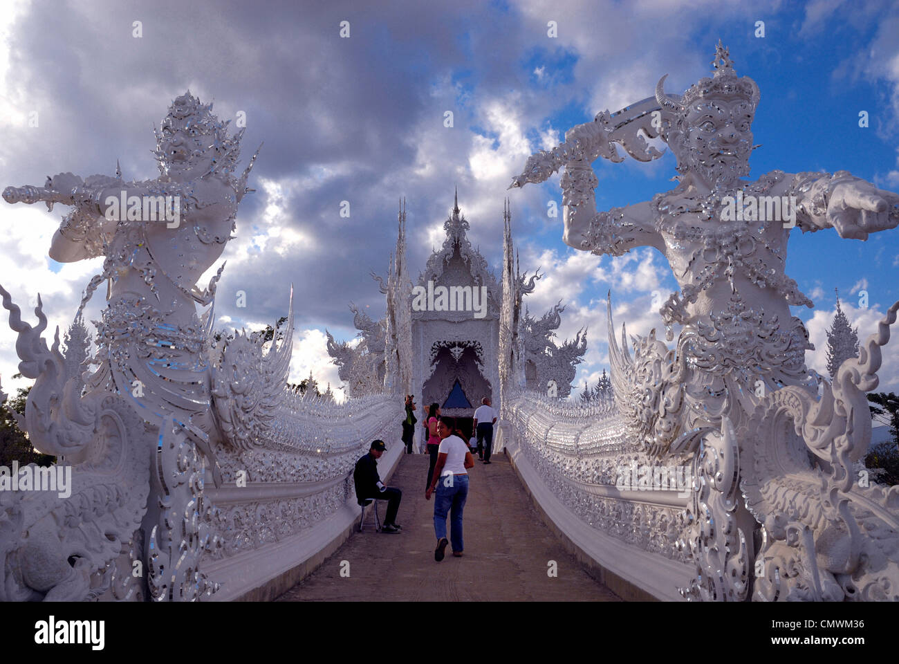 Tourists visiting the white temple in Chiang Rai Northern Thailand on ...