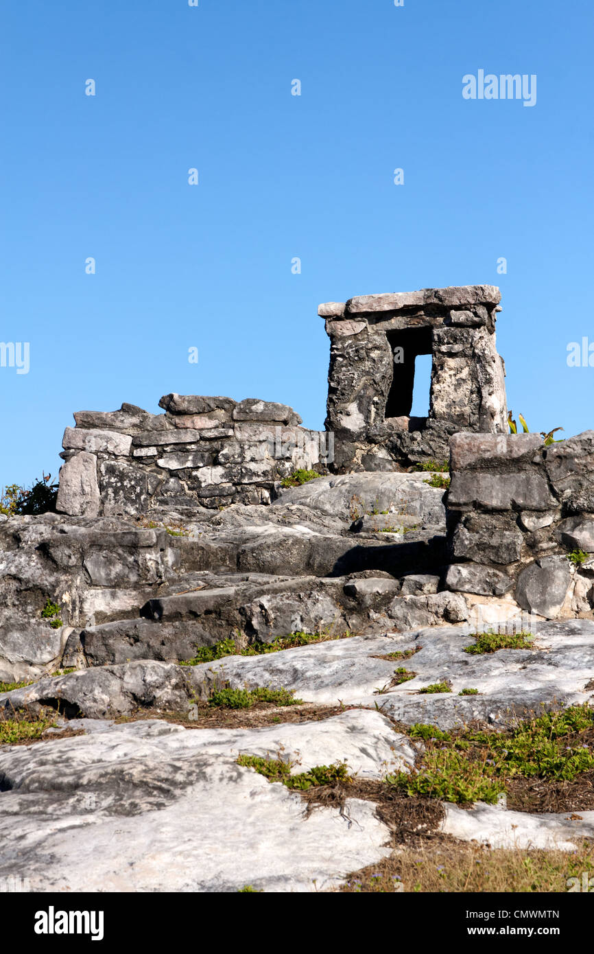 Structures of Mayan origin atop a rocky hill at Tulum, Quintana Roo, Mexico. Stock Photo