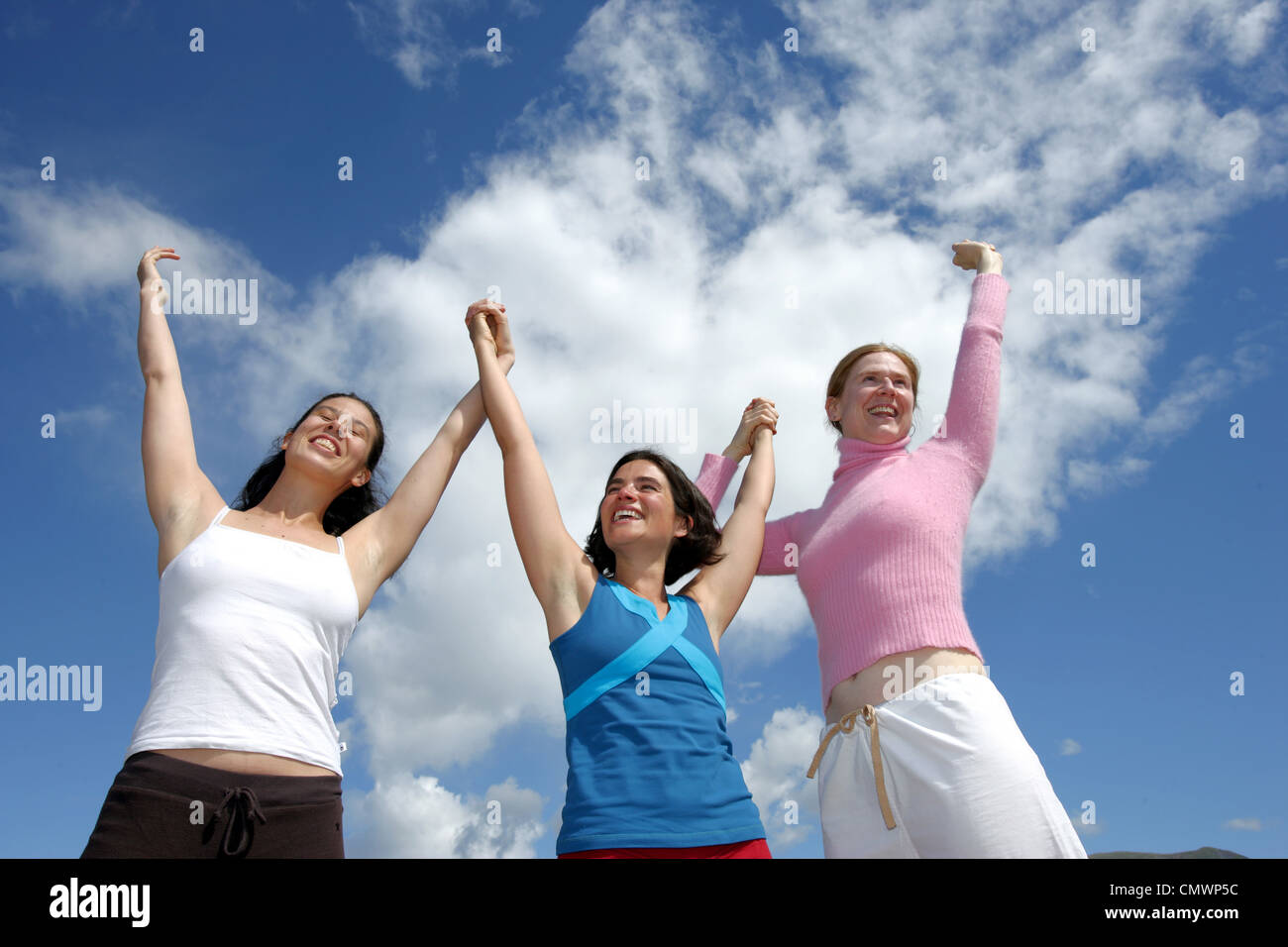 Women Holding Hands Smiling, Carcross desert, Yukon Stock Photo - Alamy