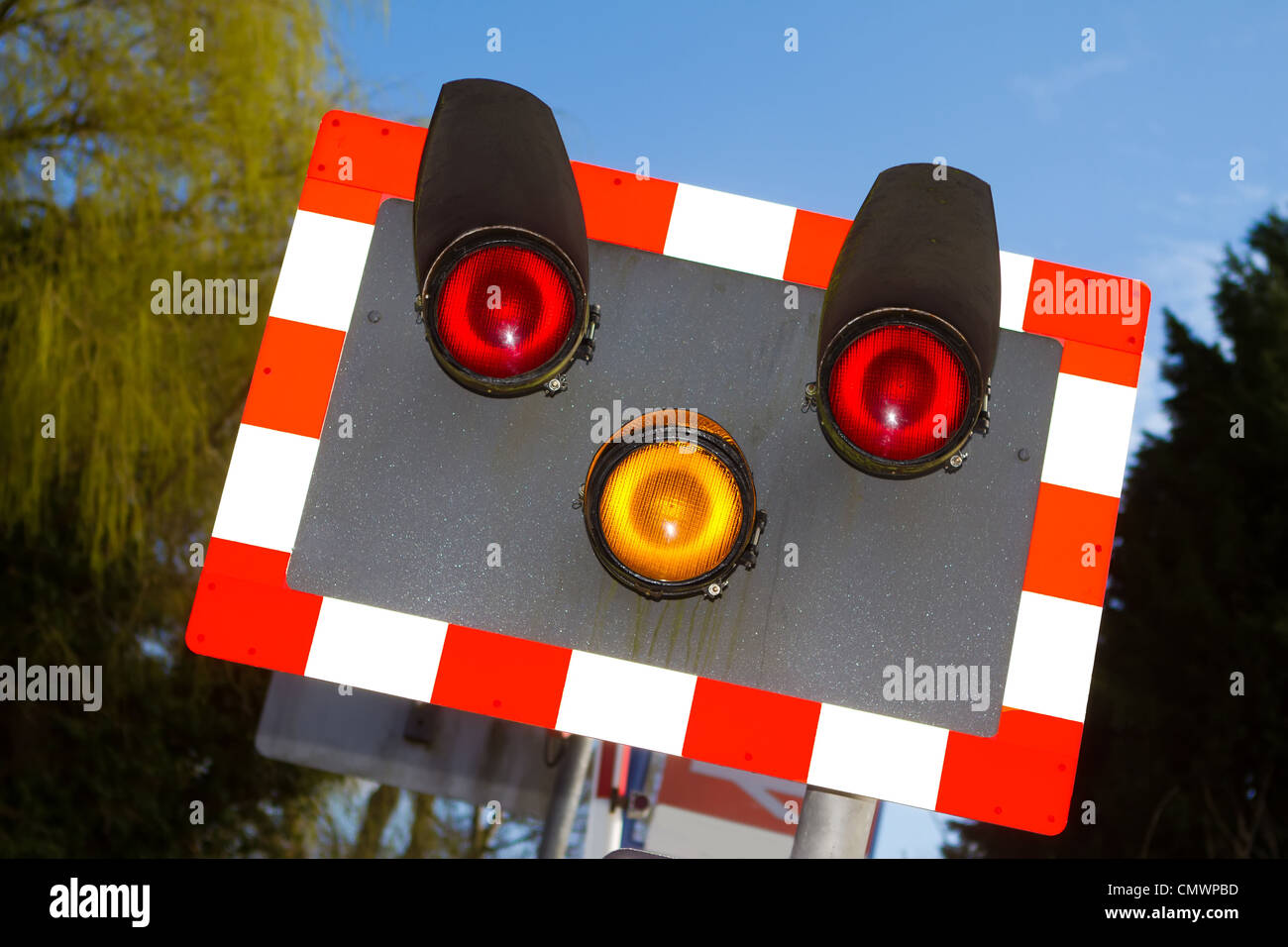 Level crossing warning lights flashing hi-res stock photography and ...